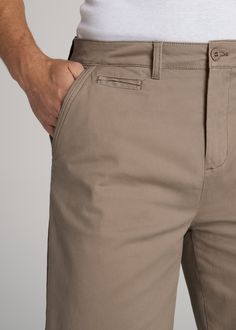 About Our Men's Long Chino Shorts Look stylish and beat the heat in these chino-style tall men's shorts. They're a shorter version of our popular chino pants that you'll want to wear all summer long. Finding clothes when you're tall is hard enough, but finding shorts is a whole other story – you need a pair that's long enough while still providing a flattering fit. That's where we come in. We crafted these shorts with your height in mind, with two different inseam options that end at the knee an Chinos Style, Beat The Heat, Tall Guys, Chino Shorts, Chinos Pants, Mens Shorts, Traditional Style, Button Up Shirts, Knee Length