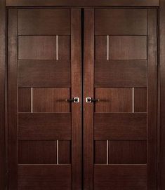 two brown wooden doors with metal handles