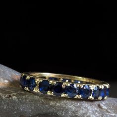 Natural Sapphire Eternity Ring, Gold Sapphire ring, Blue gemstone, September birthstone, Sapphire Je Elegant Sapphire Eternity Band For Formal Occasions, Fine Jewelry Eternity Band With Birthstone, Elegant Blue Eternity Band With Vvs Clarity, Elegant Sapphire Eternity Band With Brilliant Cut, Formal Blue Sapphire Eternity Band, 14k Gold Sapphire Half Eternity Ring, Blue Sapphire Half Eternity Ring As Gift, Blue Sapphire Ring With Half Eternity For Gift, Anniversary Gemstone Eternity Band With Round Cut