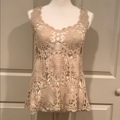 Brand New W/O Tags. Cream Colored Crochet Tank. Armpit To Armpit Is 14” Laying Flat And From Shoulder To Hem In Front Is 25” With The Back Being 27”. Beige Stretch Top With Crochet Lace, Beige Stretch Crochet Top, Beige Crochet Stretch Top, Beige Fitted Crochet Top With V-neck, Beige Stretch Crochet Lace Top, Fitted Beige Crochet Top With V-neck, Fitted Beige Crochet Knit Top, Fitted Crochet Lace Knit Top For Summer, Fitted Knit Lace Top For Spring