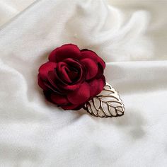 This is a super beautiful brooch! Size: 5.2cmx2cm shipping: It will take about 5 to 12 days, please contact me with any questions. Elegant Rose Brooches, Elegant Rose-colored Brooches, Handmade Flower Brooches For Wedding, Flower Shaped Brooches With Flower Decoration For Party, Elegant Flower Shaped Pins For Party, Elegant Red Brooch Pins, Elegant Flower Pins For Parties, Wedding Brooches With Handmade Flowers, Party Flower Shaped Brooch With Flower Decoration