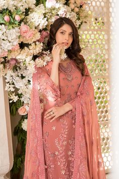 Luxury Tea Pink Embroidered Pakistani Salwar Kameez Dupatta Party Dressis a stunning attire that will give you an ethnic look on the big day. Premium quality fabric and lavish designs on this masterpiece make it the epitome of beauty and your foremost priority. Pakistani Kameez: The kameez has an alluring pink color and it is emblazoned with Embroidery and Threads. The front of thispink kameez is intricately adorned with graceful designs, making it a perfect choice to wear on the festive occasio Eid Salwar Kameez With Intricate Embroidery For Reception, Eid Reception Salwar Kameez With Intricate Embroidery, Festive Jamawar Reception Dress, Jamawar Dress With Dupatta For Reception, Reception Jamawar Dress With Dupatta, Salwar Kameez With Intricate Embroidery For Reception And Diwali, Wedding Dress With Sheer Dupatta And Jamawar Material, Eid Reception Jamawar Sharara, Wedding Dresses With Sheer Dupatta In Jamawar