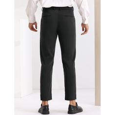 These slim-fit dress pants feature a solid color, flat front, and button closure, making them a stylish choice for men who prefer a more fitted and modern look. Perfect for formal occasions, these pants can be paired with a patterned or textured dress shirt to add visual interest to your outfit. The slim fit offers a contemporary silhouette while maintaining a professional appearance, making these trousers a versatile addition to any wardrobe. Formal Black Chinos With Pockets, Business Casual Solid Dress Pants With Belt Loops, Formal Flat Front Chinos With Belt Loops, Slim Fit Business Work Pants, Slim Fit Ankle-length Work Pants For Business, Elegant Flat Front Chinos For Business, Elegant Formal Flat Front Chinos, Slim Fit Business Bottoms, Tailored Flat Front Chinos For Formal Occasions