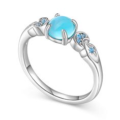 This sterling silver ring embodies a fantasy world of stars and moons.  Centered around a captivating curved blue stone, the ring is a captivating vision of the night sky, sparkling with an intense azure hue. On either side of the main stone, patterns of stars and moons are gracefully showed. Whether you're gazing at the stars on a clear night or simply admiring its beauty during the day, this ring will be a constant reminder of the magic that lies within us all.Carat Weight: 0.895 ctStone Size: Celestial Blue Gemstone Rings, Celestial Blue Rings With Accent Stones, Blue Celestial Rings With Accent Stones, Celestial Style Blue Cabochon Jewelry, Celestial Blue Cabochon Jewelry, Blue Celestial Cabochon Jewelry, Blue Celestial Moonstone Ring, Celestial Style Birthstone Ring, Celestial Blue Moonstone Ring