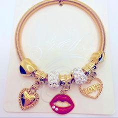 Bracelet Lips Love Hearts Crystals On Wire In Golden Tone. Won’t Tarnish Fits Up To 8 Inches . Won’t Go Out Of Shape! Brand New In Packaging Gold Heart Bangle Bracelet For Party, Gold Heart Bracelet For Valentine's Day Party, Gold Heart Bangle For Party, Trendy Heart-shaped Charm Bracelet For Party, Gold Heart Beads Bracelet For Party, Gold Bracelets For Valentine's Day Party, Gold Heart Bracelet For Party, Gold Metal Charm Bracelet With Heart Beads, Metal Charm Bracelet With Heart Charm For Party