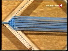 a close up of some blue sticks on a wooden table