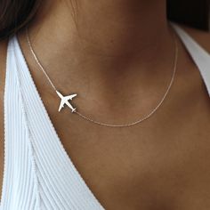 "Airplane necklace, Plane necklace, Airplane necklace for women, Travel necklace, Airplane jewelry, Silver airplane necklace, Pilot necklace Dainty Airplane Necklace, Gold Plane Necklace, Airplane Charm, Silver Airplane Necklace, Plane Pendant, Travel Necklace, Travel Lover Gift  ♡ DAINTY AIRPLANE NECKLACE ♡ Welcome to my shop, All our produtcs handmade with love. Handmade silver necklace is a very nice and dainty gift that you can buy for your loved ones or yourself.  We are happy to create a design on the necklace with your name or special names for you.  ♡ Materials: High Quality 925 Sterling Silver, Gold Plated Silver and Rose Gold Plated Silver ♡ All necklaces will be carefully packaged and sent in a special gift box. I hope you can find your personalized necklace that suits you in ou Pilot Necklace, Pilot Jewelry, Plane Jewelry, Necklace Airplane, Aviation Jewelry, Airplane Jewelry, Plane Necklace, Airplane Necklace, Travel Necklace