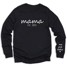 👩💕 Celebrate your journey as a mom with our Mama Est Since T-Shirt personalized with your kid's names! 🌟 Customize it for a special touch! 😍 Get yours now and wear your mom pride in style! For different Mother's Day t-shirt designs, please take a look at our Mother's Day collection. https://www.greatwoodboutique.com/collections/mothers-day-tee-shirts Crew Neck Tops With Letter Print For Family Events, Black T-shirt With Name Print For Family Events, Family Matching Custom Text T-shirt For Personalized Gift, Family Matching T-shirt With Custom Text For Personalized Gift, Personalized Family Matching T-shirt With Custom Text, Custom Text Family Matching T-shirt For Personalized Gift, Personalized Tops For Mother's Day, Mother's Day Custom Print Tops For Family Events, Family Matching Long Sleeve Custom Print T-shirt