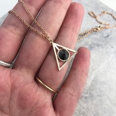 Triangle necklace for men, men's necklace with a Gold triangle pendant, gift for him, geometric necklace ---------Item Specifications------- -Total Carat Weight:  1.5 Carats -14K Rose Gold -Necklace Lenght: 55 cm -Pendant Meaurements:  20.20 X 19.70mm Diamonds Settings:  -Shape:  Round (inverted) -Weight: 1.5 Carat -Color: Black -Grade: AAA Graded Engagement shop - www.etsy.com/shop/dianarafaeljewelry Reviews - www.etsy.com/shop/dianarafaeljewelry/reviews About Diana Rafael - https://www.etsy.co Black Geometric Jewelry, Geometric Black Jewelry For Gifts, Modern Black Triangle Jewelry, Minimalist Pyramid-shaped Jewelry For Gifts, Geometric Black Necklace For Gift, Black Geometric Necklace For Gift, Diamond Pendant For Men, Black Diamond Pendant, Black Diamond Earrings Studs