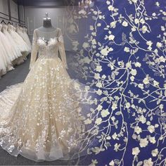 wedding gowns are on display at the bridal shop and in front of dresses