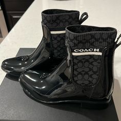 Brand New Coach Boots. Shinny Plastic Rain Boots. Coach Boots, Shoes Brand, Coach Shoes, Shoe Brands, Rain Boots, Black Boots, Bootie Boots, Ankle Boots, Women Shoes