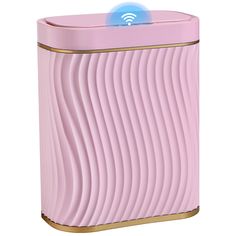 a pink trash can with a wifi button on the top and gold trimmings