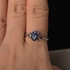 This is a gorgeous handmade creation. Its beauty is its simplicity & Elegance. The 6*8mm oval shape faceted lab alexandrite is crafted in solid sterling silver and with rhodium plated. All item is sent in a beautiful gift box If you have any idea of design your ring,pls contact me directly. You can realize more lovely stuff clicking the link https://www.etsy.com/shop/knightjewelry?refshopsection_shophome_leftnav Please leave the correct address and you phone number for delivering successfull Oval Tanzanite Birthstone Ring, Oval Faceted Birthstone Ring For Anniversary, Tanzanite Oval Birthstone Promise Ring, Oval Tanzanite Birthstone Promise Ring, Oval Tanzanite Birthstone Ring With Accent Stones, Alexandrite Ring, June Birthstone, Ring Oval, Ring Promise