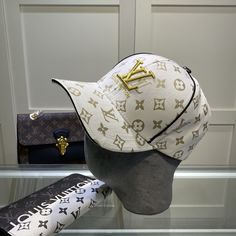 SHOP MORE LUXURY PRODUCTS HERE Description Louis Vuitton Embroidered Logo Baseball Cap White LV Cap Sports-inspired style meets impeccable craftsmanship in the LV. This easy-to-wear piece is defined by an eye-catching visor crafted from durable Monogram coated canvas. The design is finished with an adjustable strap for a custom fit. WhiteMonogram coated canvasAdjustable strap at backDry clean only Includes box, dust bag.This product is of the premium quality. Designer Streetwear Cap, Designer Baseball Cap For Streetwear, Luxury Visor Baseball Cap For Streetwear, Luxury White Snapback Hat, Luxury Baseball Cap For Streetwear With Visor, Luxury White Baseball Cap, Luxury Streetwear Baseball Cap, Luxury White Visor Hat, Luxury Snapback Baseball Cap