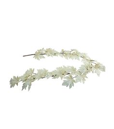 two white flowers and leaves are on the headband