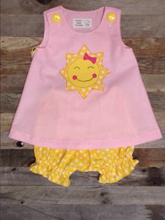 Our Little Sunshine dress and bloomers is the perfect outfit for a first birthday. The dress can be personalize with her name. -This unique Our Little Sunshine dress is made with a pink cotton fabric. -The bloomers are a yellow and white polka dotted fabric. -Name can be added to dress for no additional charge. Available in sizes 9 months, 12 months, and 18 months Toddler sizes also available The colors of the outfit can be customized to fit your party. Pink Cotton Dress For First Birthday, Cotton Sleeveless Set For First Birthday, Pink Cotton Sets For Birthday, Our Little Sunshine First Birthday, Little Sunshine First Birthday, Sunshine First Birthday, Sunshine Dress, First Birthday Dress, First Birthday Dresses