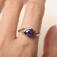 All HANDMADE ITEMS SHIP IN APPROX 8 DAYS Main Stone: Real natural amethyst Main Stone Size: Trillion cut 6 mm x 6 mm Main Stone Weight: 0.89 carat Side Stone: None Height From The Ring Setting Bottom(to gemstone top): about 4.54 mm Width of Ring band Measure: gradually varied,about 1.43 to 2.22 mm Material: 925 Sterling Silver/14K White Gold/14K Yellow Gold/14k Rose Gold Engraved: Available For FreeNo more than 13 letters) Customized:Of course! Tell me what you want Includes With Order: All of m Minimalist Amethyst Birthstone Ring For Anniversary, Silver Trillion-cut Birthstone Ring, Silver Trillion Cut Birthstone Ring, Silver Trillion Cut Ring With Birthstone, Minimalist Trillion Cut Promise Ring, Trillion Cut Solitaire Sterling Silver Jewelry, Trillion Cut Polished Ring, Gift, Trillion Cut Rings With Polished Finish For Gift, Trillion Cut Ring With Polished Finish As Gift