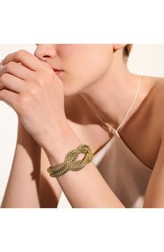 Inspired by the lasting ties of love, this handcrafted knot bracelet showcases signature woven chains in gleaming 14-karat gold. Push-clasp closure 14k gold Imported Knot Bracelet Gold, John Hardy Necklace, Love Knot Bracelet, Gold Knot Bracelet, Gold Gauges, Yellow Love, Double Chain Necklace, Graduation Necklace, Woven Chain