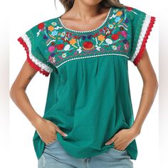 Yzxdorwj Mexican Embroidered Lace Traditional Colorful Blouse Tricolor Top. Size Small. 20 Inches Pit To Pit. 25 Inches Long. Nwt This Beautiful Mexican Patria Lace Blouse Is Perfect For A Mexican Party, May 5th Festivals, Holidays And Even Everyday Wear. The Sleeves Are Lace In The Color Of Mexican Flag, Unique And Bright, And The Top Is Made Of 100% Cotton, Comfortable And Skin-Friendly, Colorful Embroidered Flowers. It Makes A Perfect Summer Loose Blouses For A More Casual Day.Or It Can Be Pa Green Floral Embroidered Crew Neck Blouse, Green Embroidered Crew Neck Blouse, Green Crew Neck Blouse With Floral Embroidery, Casual Green Blouse With Floral Embroidery, Summer Green Blouse With Embroidered Neckline, Spring Tops With Contrast Embroidery And Short Sleeves, Short Sleeve Tops With Contrast Embroidery For Spring, Spring Short Sleeve Tops With Contrast Embroidery, Embroidered Multicolor Tops