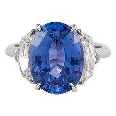 an oval blue sapphire and diamond ring