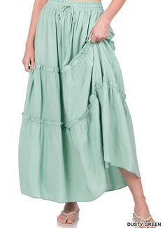 This full-length skirt is designed with an effortless pull-on waistband and a tiered A-line silhouette. This maxi style is made with a soft rayon fabric that's as lightweight as it is lovely, perfect for any day styling. Appx. 37"-38" length. True to Size Functional drawstring Elastic Waistband 100% Rayon WAIST: S- 26" M- 28" L- 30" XL- 32" 1X- 34" 2X- 36" 3X- 38" Ruffle Maxi Skirt, Fringe Fashion, Dusty Green, Tiered Maxi Skirt, Full Length Skirts, Womens Maxi Skirts, Maxi Styles, Modest Clothing, Rayon Fabric