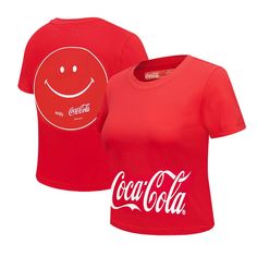 Step out in Coca-Cola style with this  Smile Baby Doll T-shirt. Crafted by Freeze Max. it features street-inspired graphics of the iconic cola over a cropped design. Finish any 'fit in with this sleek Coca-Cola tee. Pop Culture Short Sleeve T-shirt For Spring, Pop Culture Graphic Print Tops In Relaxed Fit, Relaxed Fit Graphic Print Tops Pop Culture, Relaxed Fit Graphic Print Tops For Pop Culture, Trendy Red T-shirt With Logo Print, Spring Short Sleeve Crop Top With Logo Print, Red Retro Top With Graphic Print, Casual Logo Print Crop Top For Spring, Casual Cotton Crop Top With Logo Print