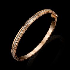 Our Signature Collection Cuff Bracelet in Solid 18K Rose Gold with round brilliant diamonds. Approx. 2 Carats. VS+ Clarity. F+ Color. Luxury Classic Single Diamond Bracelet, Luxury Gold Bracelet With Single Cut Diamonds, Luxury Rose Gold Bracelet With Single Cut Diamonds, Luxury Rose Gold Bracelets With Single Diamond, Diamond And Gold Bangles, Luxury Anniversary Bangle With Single Cut Diamonds, Luxury Round Bangle With Pave Setting, Luxury Rose Gold Diamond Bracelet With Pave Setting, Rose Gold Bangle With Single Cut Diamonds