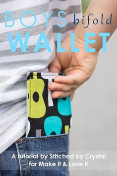 a person is holding a small wallet in their pocket with the words boys'bifold wallet