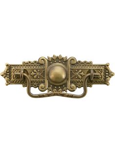 an ornate brass door handle on a white background