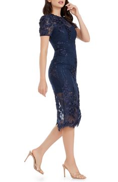 Shimmering sequins and dimensional floral appliqués add eye-catching romance to this elegant sheath dress. 45" length (size Medium) Back zip closure Jewel neck Short sleeves Partially lined 100% polyester Dry clean or hand wash, line dry Imported Knee-length Floral Embellished Evening Midi Dress, Fitted Floral Applique Evening Dress For Party, Elegant Fitted Evening Dress With Contrast Sequin, Knee-length Floral Applique Midi Dress, Elegant Contrast Sequin Wedding Dress, Elegant Sheath Midi Dress With Sequins, Formal Fitted Dress With Floral Applique, Elegant Cocktail Dresses With Contrast Sequin, Elegant Contrast Sequin Cocktail Dresses