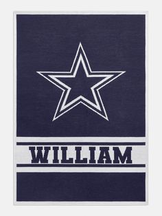 a blue and white towel with the word william on it