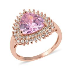 This Elegant Simulated Pink Sapphire Ring Is An Ideal Choice For A Glamourous Style. Laced With Simulated White Diamonds Encircling The Center, This Ring Features Trillion Shaped Simulated Sapphire With Soft Pink Sparkles. Set In A Designer Frame Of Sterling Silver With 14k Rose Gold Finish, This Ring Will Enhance Your Fashion Quotients In Seconds. Ring Is 925 Stamped. Main Stone: Cubic Zircon Pink Trillion 10 Mm Faceted Other Stones Are White Cz. Formal Pink Diamond Ring With Accent Stones, Pink Diamond Ring With Halo Setting For Formal Occasions, Pink Diamond Ring With Halo Setting For Formal Events, Formal Pink Gold Rings With Halo Setting, Formal Pink Gold Halo Setting Rings, Formal Pink Morganite Rings, Formal Pink Halo Design Ring, Elegant Pink Ring With Diamond Accents, Elegant Pink Jewelry With Center Stone