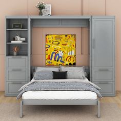 a bed with a painting on the wall above it in a room that is painted pink and grey