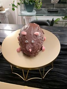 a cake shaped like an animal sitting on top of a table