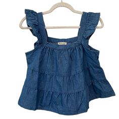 Ruffled Sleeves Tiered Design Cotton & Polyester Blend Blue Denim Features: Tiered Tank Size: Womens Xl Condition: New With Tags Trendy Ruffled Denim Top For Spring, Chic Ruffled Denim Top For Summer, Chic Denim Top With Ruffles For Spring, Casual Dark Wash Denim Top With Ruffles, Trendy Ruffled Medium Wash Denim Top, Denim Blue Ruffled Top For Day Out, Summer Denim Tops With Ruffles, Fitted Medium Wash Denim Top With Ruffles, Trendy Ruffled Denim Top For Summer