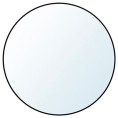 a round mirror is shown with black lines on the bottom and bottom half, as well as an oval shape