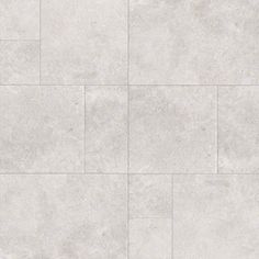 a white tile floor with grey grouting