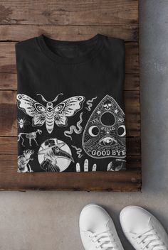 Thanks for stopping by! Dark Cottagecore T-shirt Printed on a super soft, cotton tee Dispatched in 5 working days or sooner Unisex Free UK delivery Material: 100% ringspun cotton. Chest (to fit): S  34/36   M  38   L  40/42   XL  44/46   XXL  48/50 ECO-FRIENDLY Each garment is made to order, reducing extra material and energy that would be otherwise wasted We use DTG printing process which is easier on the environment than screen-printing Our ink is bright and also eco-friendly. Do not tumble dr Grunge Tshirt, Clothing Grunge, Dark Clothing, Alt Clothing, Grunge Fairycore, Grunge Clothing, Cottagecore Shirt, T Shirt Company, Dark Cottagecore