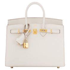 Hermes Birkin 25cm Sellier Craie Off White Cream Epsom Gold Do not miss this perfect little jewel - the only Birkin you need day and night, all four seasons! Brand New in Box. Store Fresh. Pristine Condition (with plastic on hardware) Perfect gift! Comes in full set with clochette, lock, keys, raincoat, dust bag, and Hermes box. Craie is the most coveted and incredibly gorgeous off white or cream color that is uber chic and goes with every color. Ideal with all manners of beige, brown, black, wh Hermes Birkin Bag 25, Birkin Purse, Birken Bag, Hermes Store, Hermes Kelly 25, Hermes Kelly Bag, Cream Bags, Hot Bags, Hermes Birkin 25