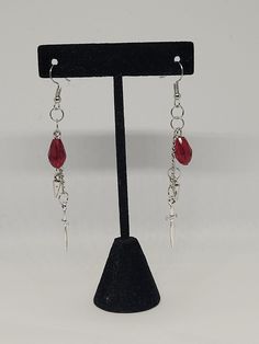 Orin the Red dangle earrings, Baldur's Gate inspired statement jewelry, video game fashion accessory, gift ideas for her, spring trends These funky earrings are inspired by Orin from Baldur's Gate 3 Charms are nickel free while the fishhooks are made from sterling silver so they are safer for more sensitive ears. If you would rather have clipons or leverbacks please leave it as a note to seller! Both earrings and my workspace are properly sanitized to ensure your safety during these unprecedented times. Video Game Fashion, Jewelry Video, Baldur's Gate 3, Baldurs Gate, Funky Earrings, Gift Ideas For Her, Baldur's Gate, Spring Trends, Sensitive Ears