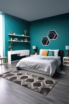 a modern bedroom with teal walls and white furniture in the room, including a bed