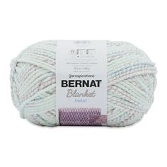 bernat blanketed twist yarn ball in white and pink, on a white background