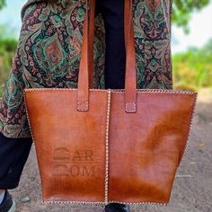 Leather Bag Handmade Bag Brown Bag ## Product Characteristics ## -Dimension :(11.80H * 15.35W)inch [30H * 39 W cm ] -Color : Brown -Material: 100 % genuine leather -100% Handmade This bag is handcrafted from high quality goat leather. The leather we use is treated with natural materials that make the leather has no unpleasant smell. This bag is the best choice for you , because it is very comfortable and durable. ##Note ## We still need your phone number for the shipping company can you please send it! Leather Bag Handmade, Leather Hobo Bags, Handbag For Women, Brown Bag, Handmade Bag, Leather Bags Handmade, Goat Leather, Shipping Company, Brown Bags