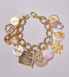 Commission a truly one-of-a-kind charm bracelet inspired by your life! Here's how it works~ 1. Place your order 2. Once your order is placed, please fill out this form here ! https://form.jotform.com/230185187225051 You do not pick specific charms; instead the questionnaire asks for meaningful initials and birth months; favorite hobbies, colors, good luck symbols; personal style, passions, wrist size and more.  3. Using this information, John will design a bracelet, selecting 12-15 charms from h Luck Symbols, Charm Necklace Diy, Custom Charm Bracelet, Good Luck Symbols, Bracelet Inspired, Custom Charms, Jewelry Inspo, Girls Jewelry, Beautiful Gift Boxes