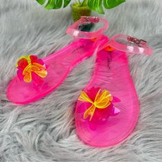 Betsey Johnson Tabby Jelly Sandal Front Embellished Flower Size 37 Color Pink / Green Neon 0.5" Flat Heel Buckle Closure Upper - Polyvinyl Chloride, Lining - Manmade, Sole - Manmade Round Toe Polyvinyl Chloride (Pvc) New No Tagd (Never Worn) Trendy Adjustable Jelly Sandals For Spring, Adjustable Synthetic Jelly Sandals For Spring, Adjustable Flower Sandals, Adjustable Jelly Sandals With Flat Heel For Spring, Adjustable Ankle Strap Jelly Sandals For Spring, Pink Jelly Sandals With Ankle Strap For Party, Pink Ankle Strap Jelly Sandals For Party, Adjustable Flower Sandals For Spring, Trendy Flower-shaped Sandals For Summer