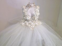 a dress made out of tulle and flowers