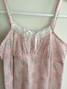 Adorable, romantic Laura Ashley Pink Paisley Nightgown  Size Small Length is 45 inches Bust unstretched is 15 inches Stretched (there is an elasticized band sewn into the back seam) is 17.5 inches Ribbon bow at bust.  Cotton/poly blend Cotton Sleepwear With Lace Trim For Bedtime, Sleeveless Coquette Sleepwear, Coquette Sleeveless Sleepwear, Cottagecore Cotton Nightgown For Bedtime, Coquette Lace Trim Sleepwear For Pajama Party, Cotton Nightgown With Lace Trim For Bedtime, Feminine Nightgown With Lace Trim For Bedtime, Fitted Floral Print Sleepwear For Bedtime, Feminine Lace Trim Nightgown For Bedtime