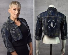 ONLY ONE AVAILABLE! SIZE: 22 XXL The Furiosa Crop Top Jacket in a stunning new shade, Blue Denim. This unique piece is a twist on our best-selling Furiosa Jacket, offering a fresh color palette for those seeking a standout style. Its cropped design and waist-emphasizing cut make it a chic and bold choice for anyone looking to make a fashion statement. Handmade with meticulous attention to detail, this denim cropped jacket provides a unique and rugged appearance that complements various styles. W Fitted Punk Distressed Outerwear, Fitted Distressed Punk Outerwear, Distressed Fitted Punk Outerwear, Fitted Denim Jacket For Fall Alternative Fashion, Fitted Punk Denim Jacket For Alternative Fashion, Fitted Distressed Grunge Outerwear, Punk Style Fitted Denim Jacket For Alternative Fashion, Distressed Fitted Grunge Outerwear, Fitted Denim Jacket For Alternative Grunge Fashion