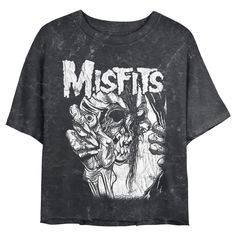 Celebrate the legendary horror-punk band and pop culture icons, The Original Misfits with officially licensed apparel featuring the classic "Fiend Skull" and more! This Juniors' Misfits Distressed Eye Skull Cropped Graphic T-Shirt features an epic, distressed graphic of a skull holding out an eyeball in white with the classic Misfits logo in matching white lettering printed above. Rock out to the genre-defining Misfits in ultimate style with these fun new tees for everyone! Misfits Logo, Pop Culture Icons, Horror Punk, Rock Band Tees, Emo Aesthetic, Cowl Neck Sweatshirt, Skull T Shirt, Punk Bands, Graphic Tee Design