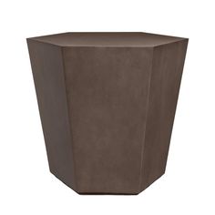 a large brown planter sitting on top of a white floor next to a wall